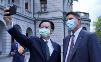 China Flies 18 Warplanes Near Taiwan During US Envoy’s Visit