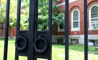 A view of a gate to Harvard Yard on the campus of Harvard University. | Maddie Meyer/Getty Images