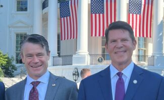 Senator Young and Keith Krach at White House signing of CHIPS and Science Act