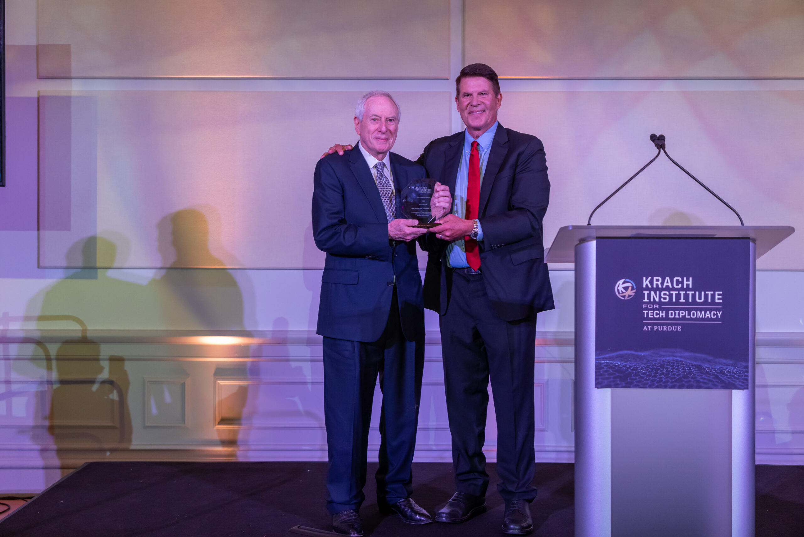 Keith Krach presents the Krach Institute Freedom Award to former NASA Administrator Dan Goldin.
